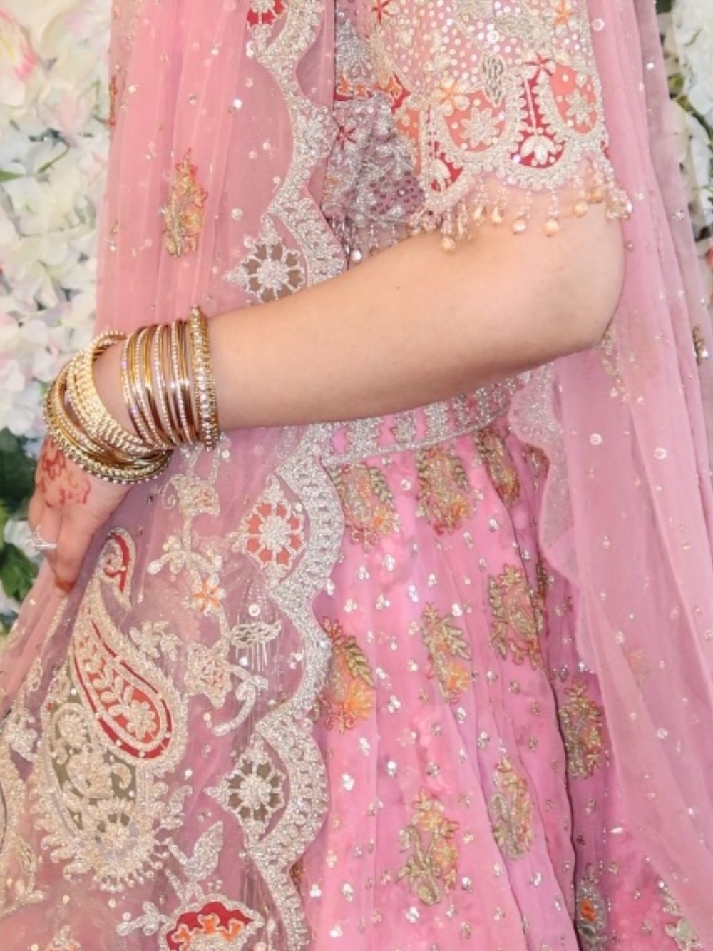 Rimple and Harpreet Lehenga